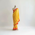 Elegant sari and lehenga ensemble by CoutureMantra featuring intricate embroidery and vibrant traditional designs.