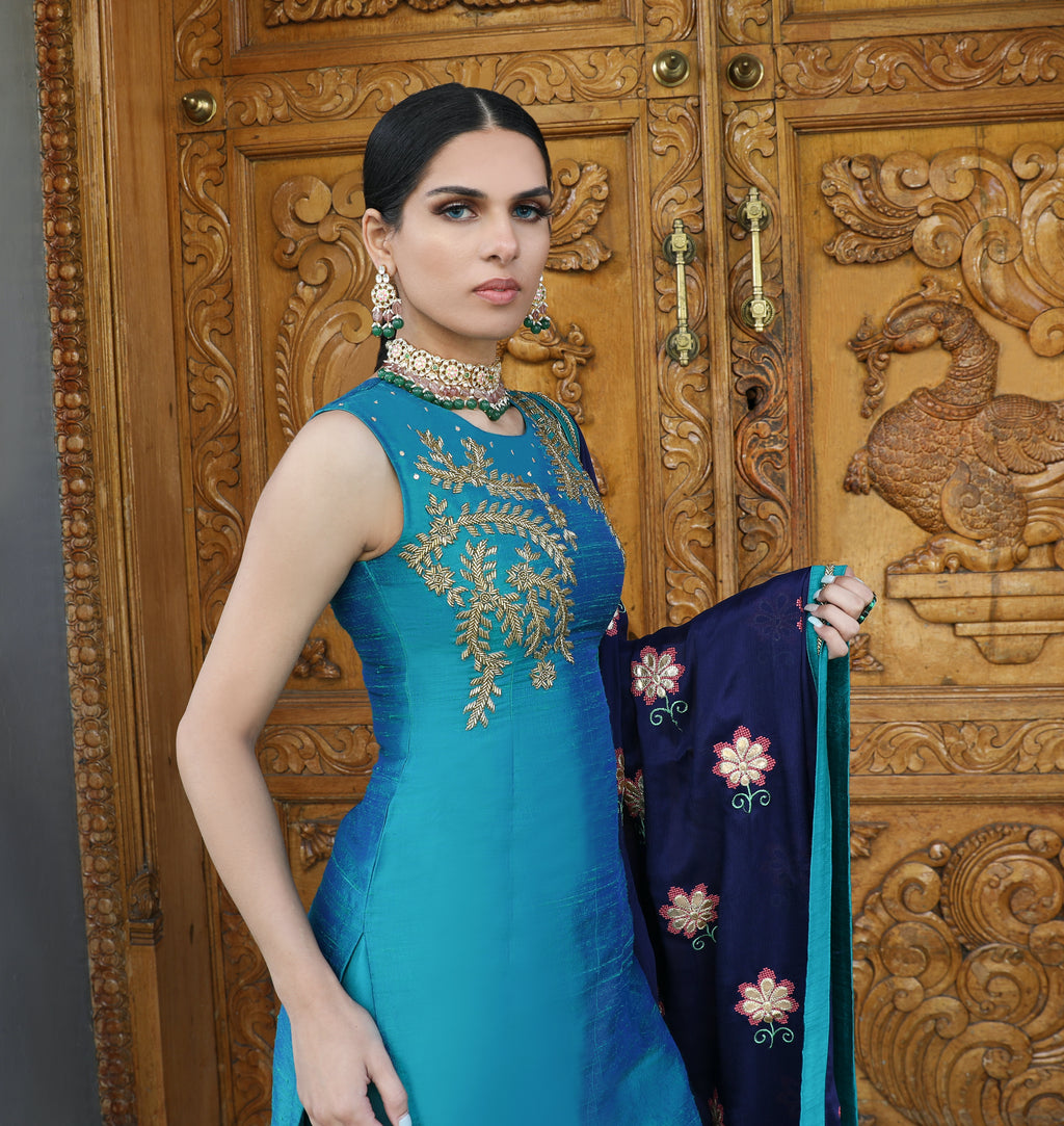 Couture Mantra Begum Kurti set with peacock and midnight blue pajami suit, featuring intricate embroidery and traditional design.