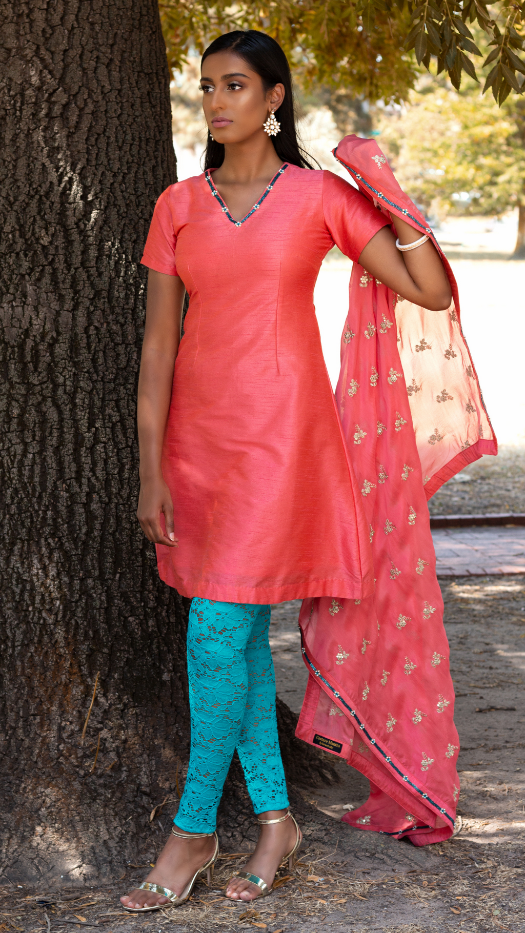 Peach lace pajami suit by Couture Mantra featuring intricate lace details and traditional design, perfect for festive occasions.