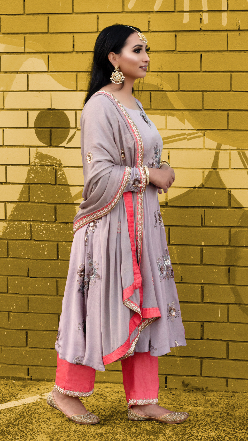 Vogue Frock set from Couture Mantra featuring a stylish, traditional design with intricate embroidery and vibrant fabric.