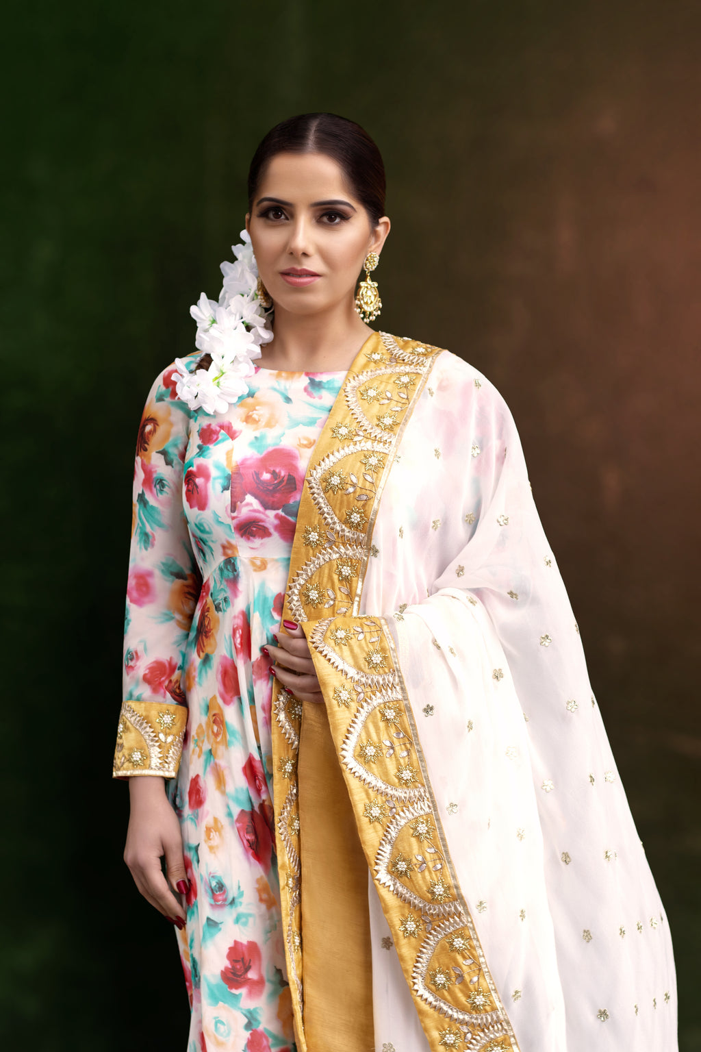 Couture Mantra floral frock set for girls with colorful flower patterns and sleeveless design, perfect for spring and summer occasions.