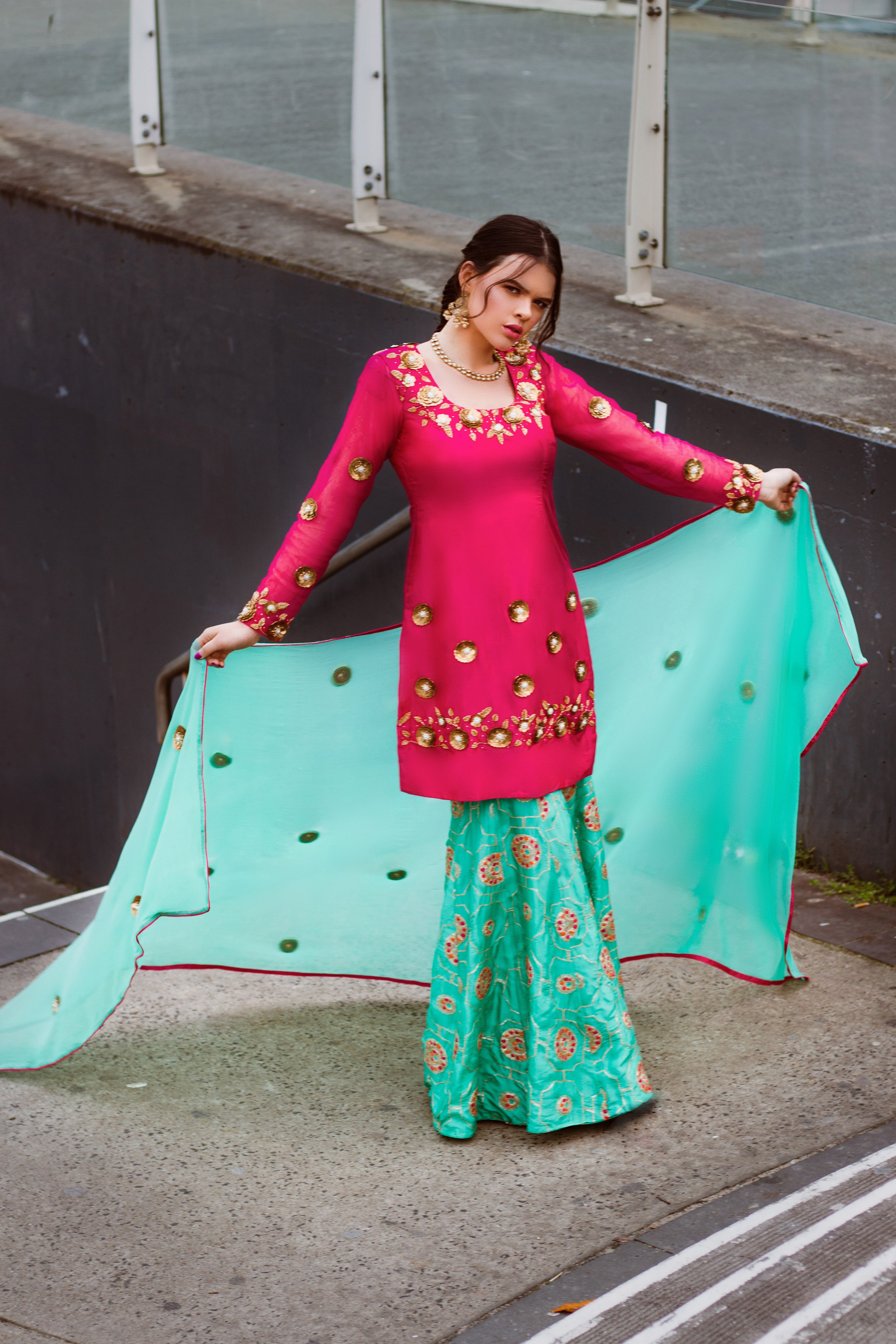 Amanpreet Gazal Gharara Set with intricate embroidered sharara pants and matching top, showcased on a hanger.