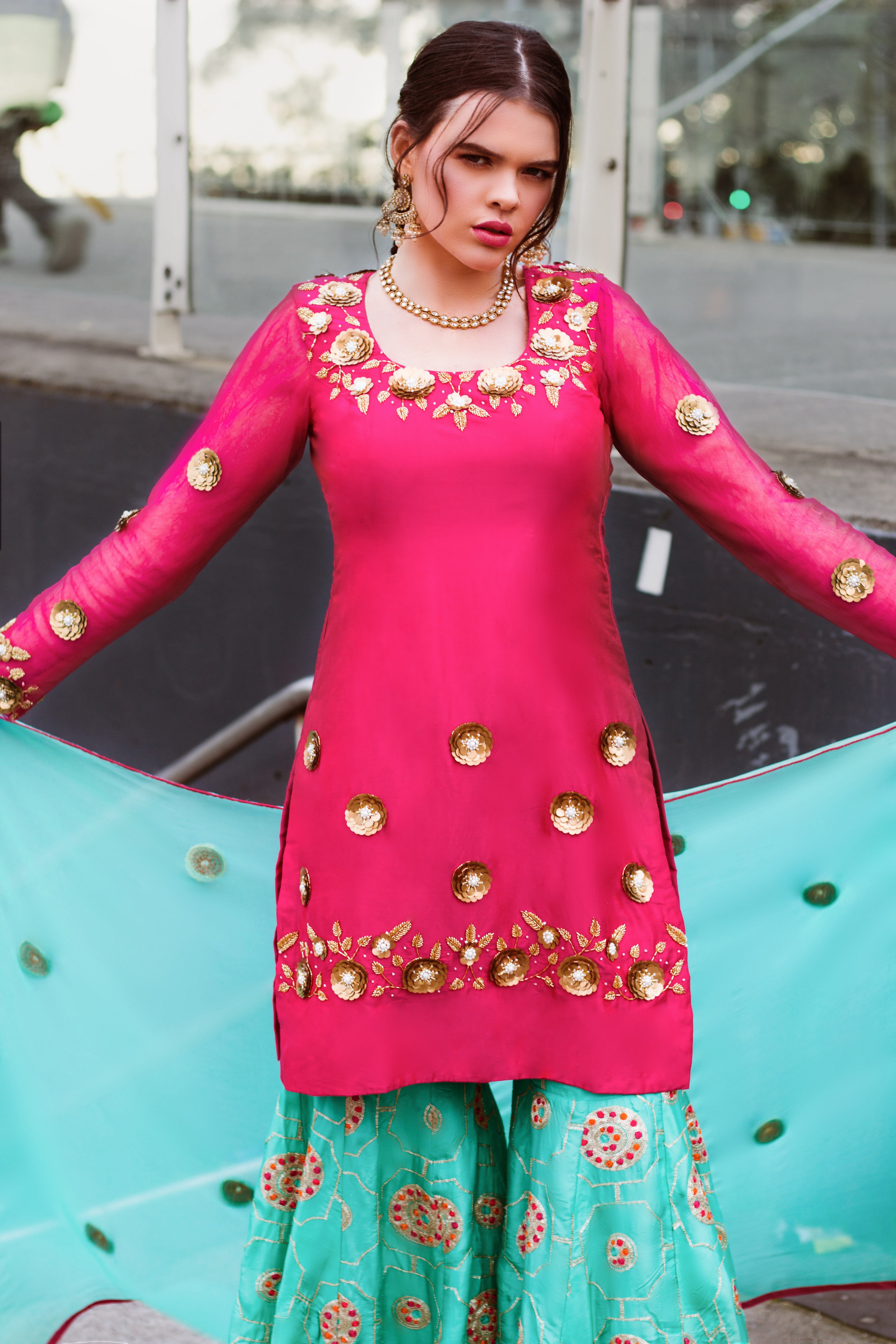 Amanpreet Gazal Gharara Set with intricate embroidery, featuring a traditional sharara pants and matching top, in vibrant colors.