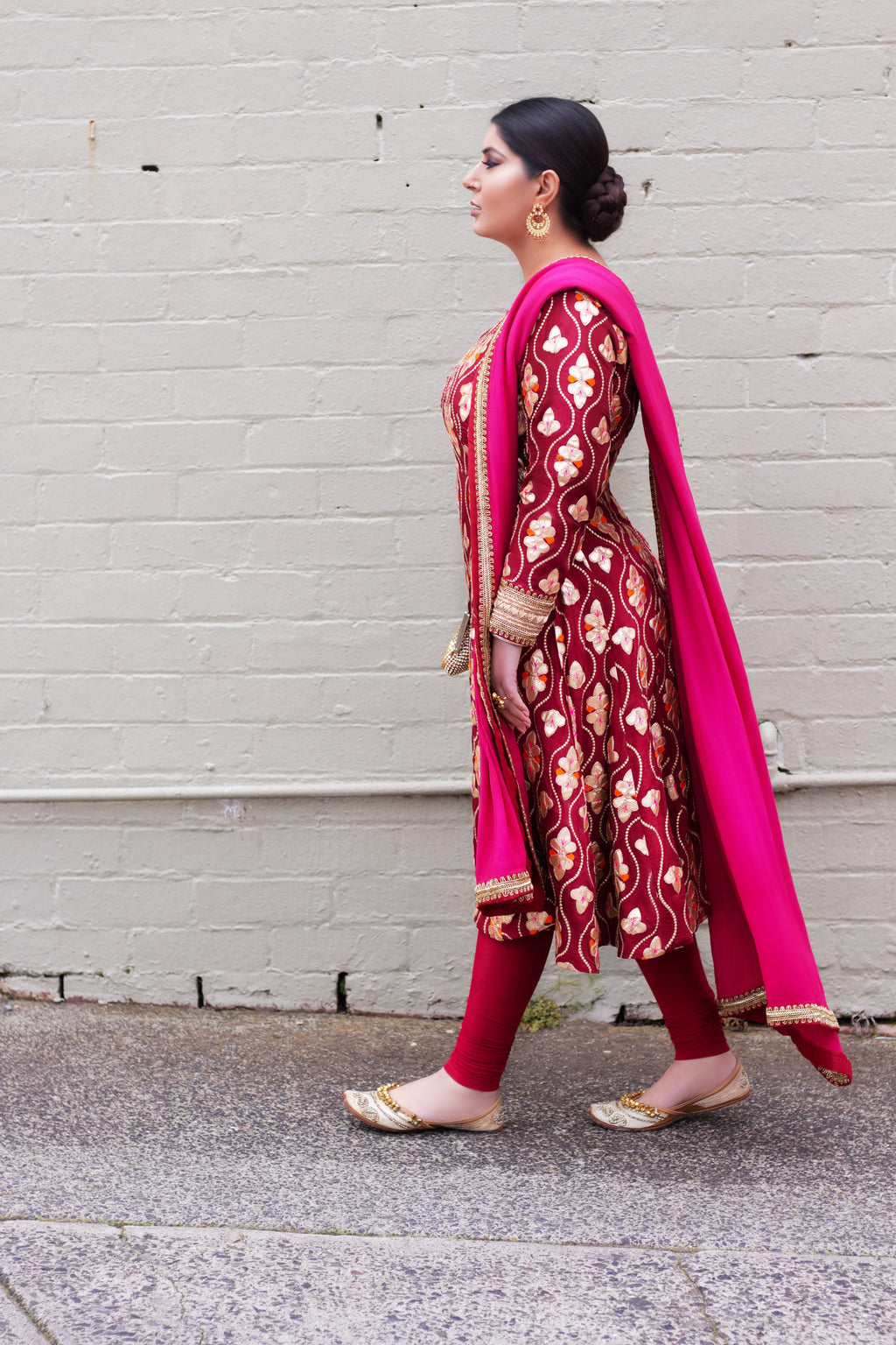 Maroon Patiyala frock by Amanpreet, featuring traditional design and fabric, shown on a mannequin.