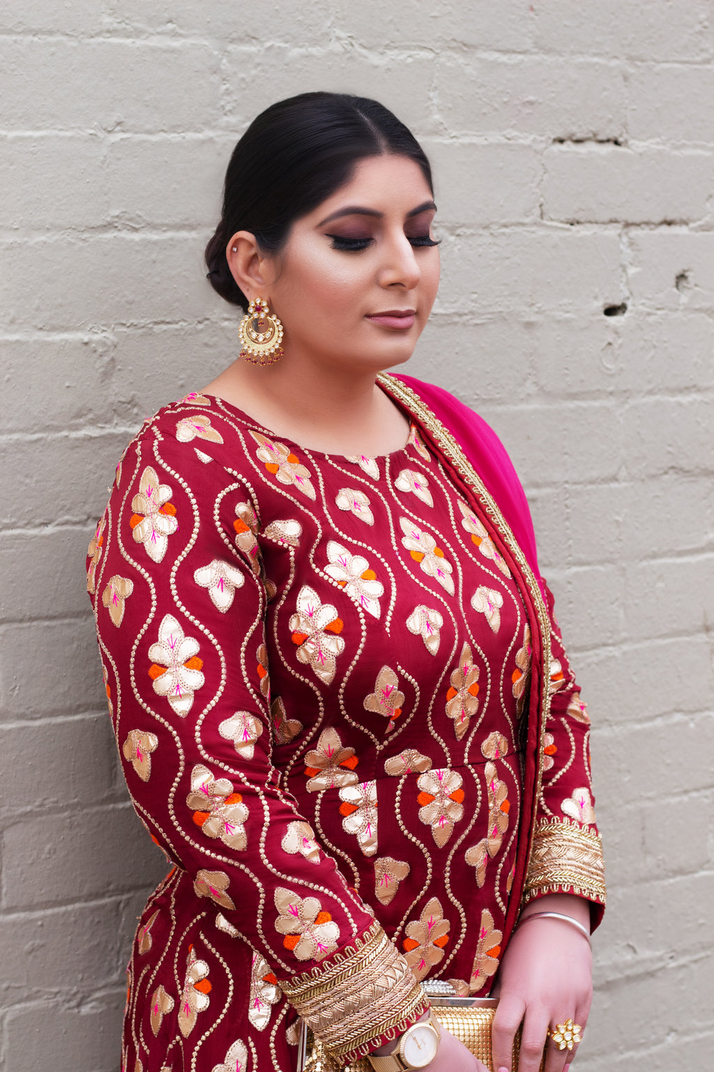 Maroon Patiyala frock by Amanpreet featuring traditional design, flowing fabric, and intricate detailing on the dress.
