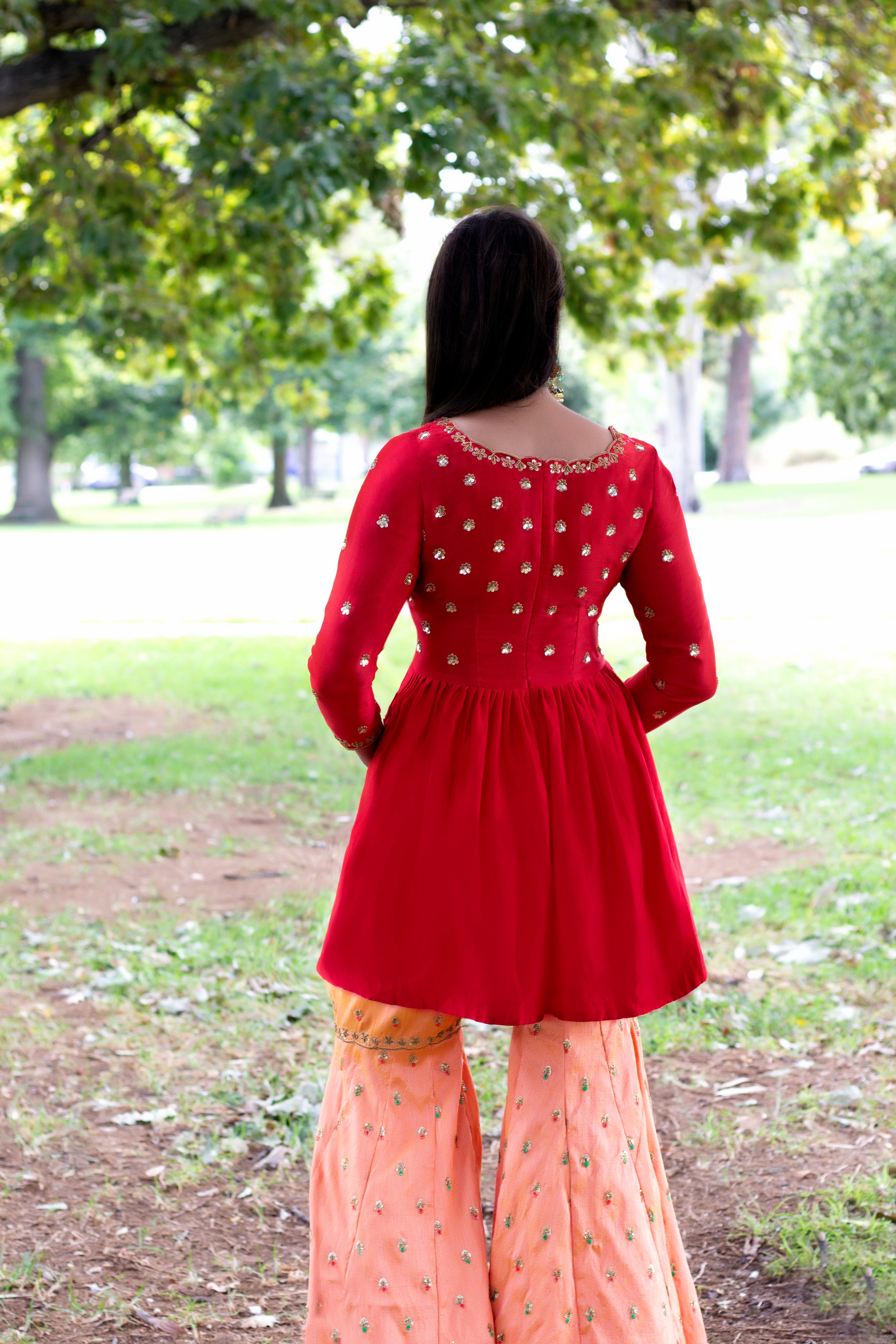 Elegant Mulberry Gharara set by Couture Mantra featuring a traditional sharara with intricate embroidery and matching top