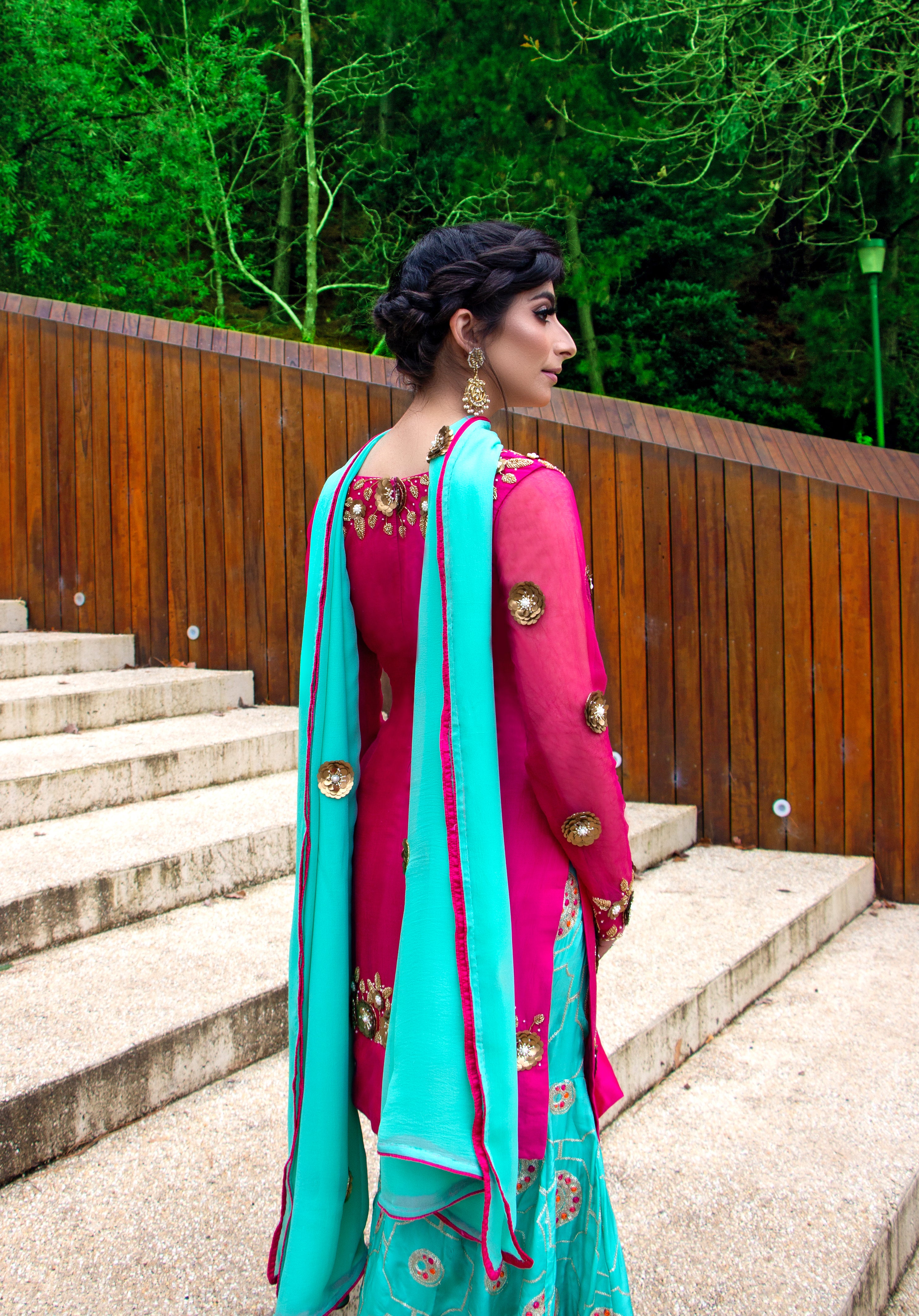 Amanpreet Gazal Gharara set with intricate embroidery, featuring a sharara pant, matching top, and dupatta displayed on a hanger.