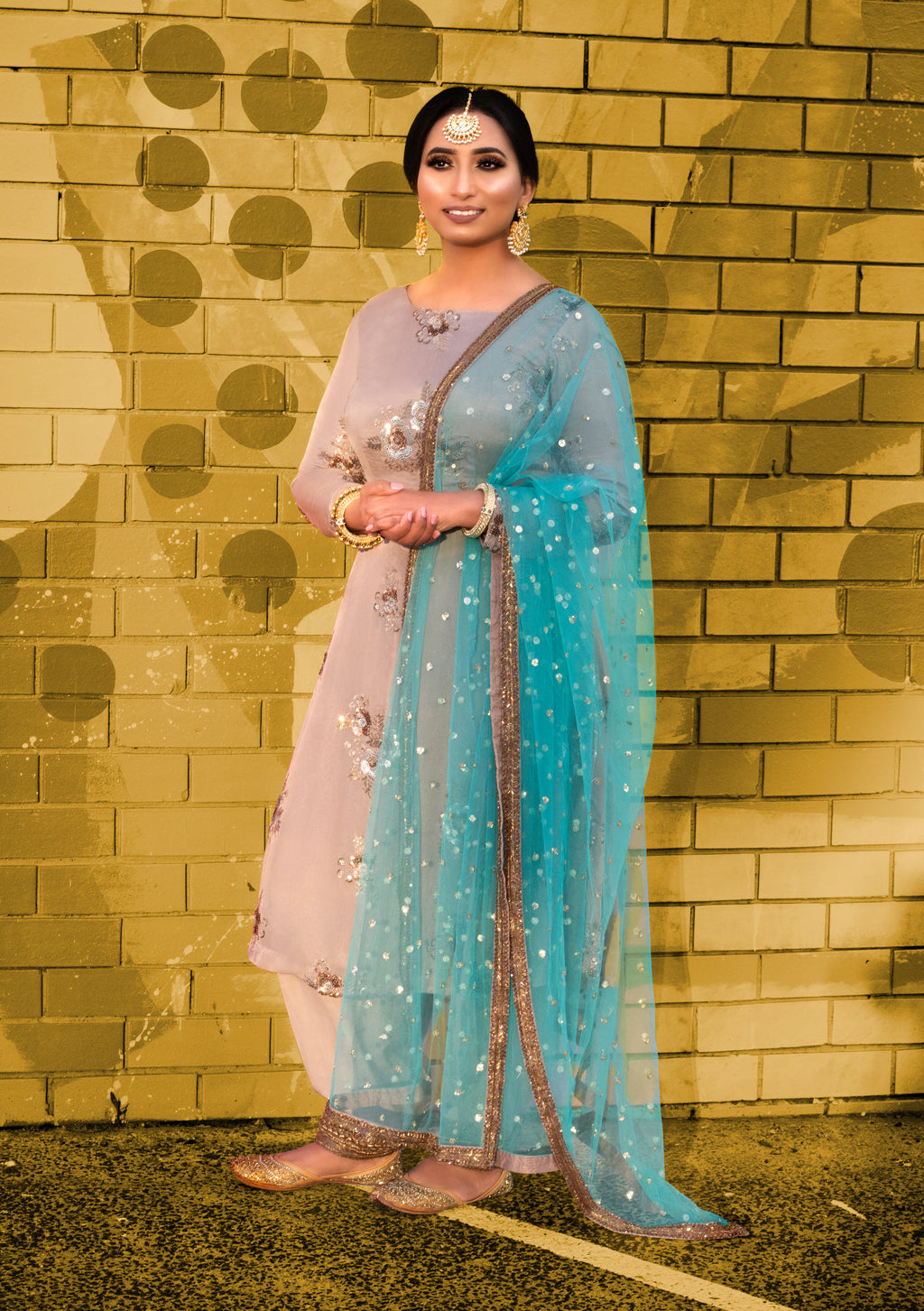 Amanpreet dusty Patiyala frock set with intricate embroidery, featuring a flowing frock and matching accessories on a model.