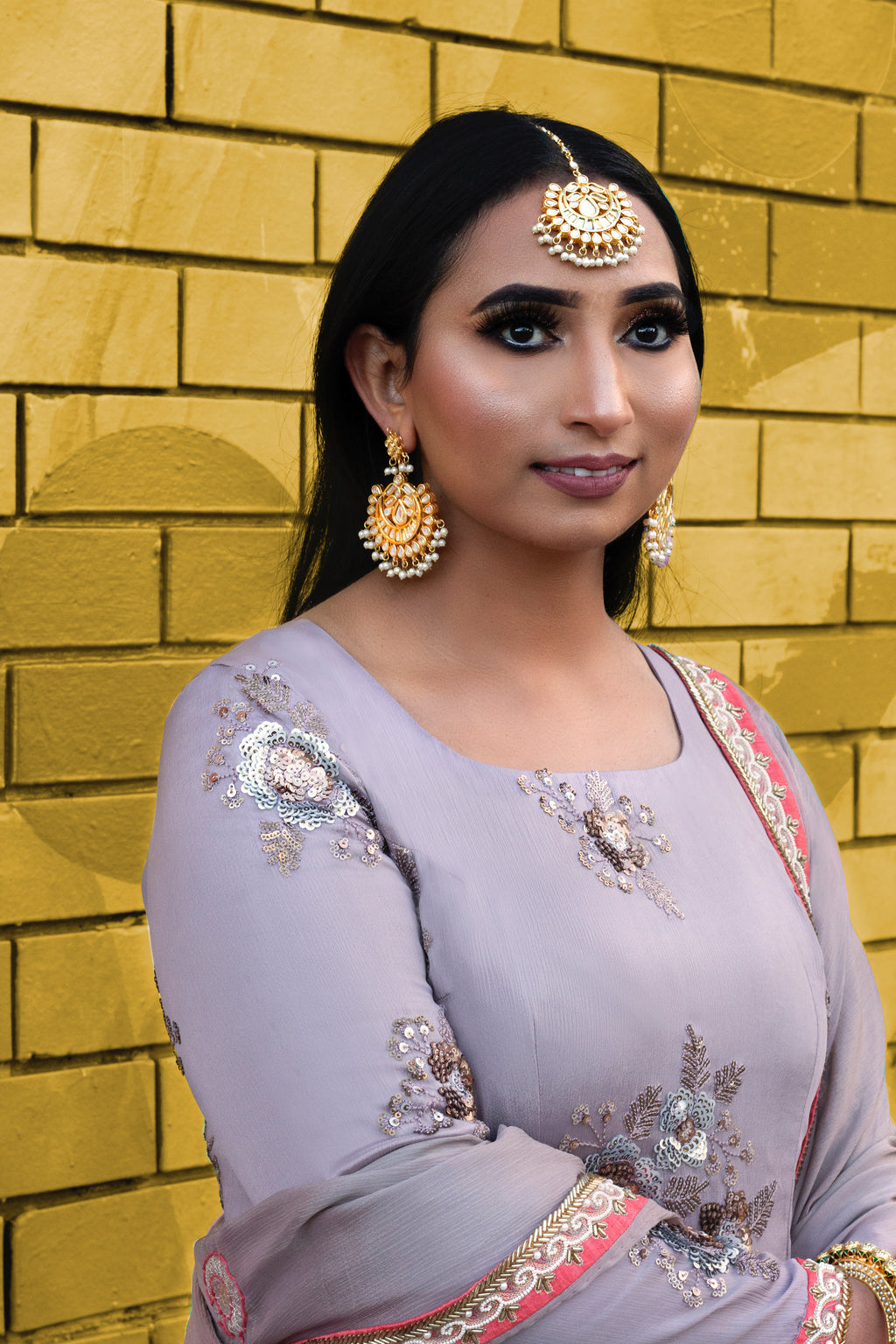 Couture Mantra Vogue frock set featuring a stylish, colorful dress with intricate embroidery and matching accessories.