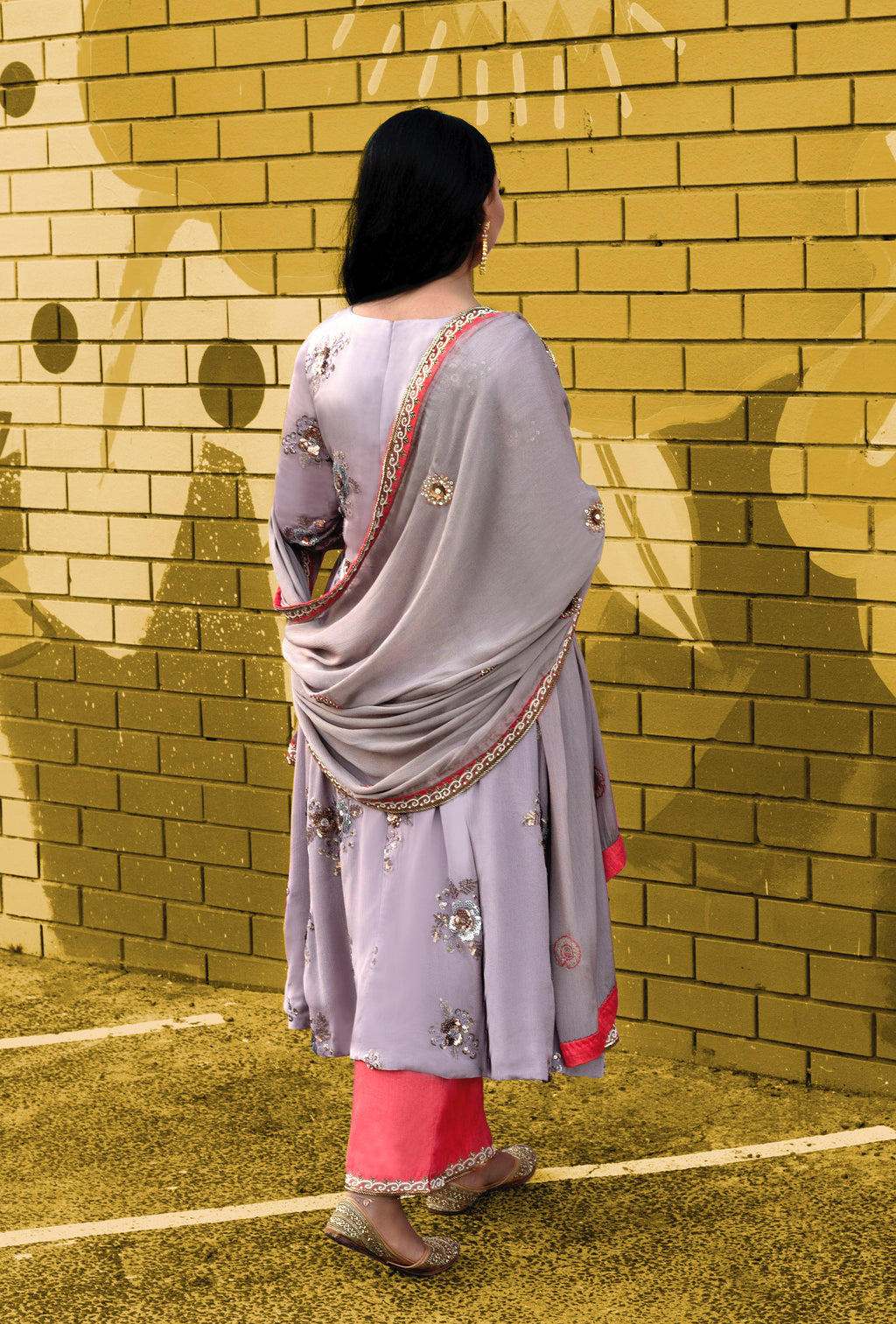 Vogue Frock set by Couture Mantra featuring a stylish printed dress with matching accessories and intricate embroidery.