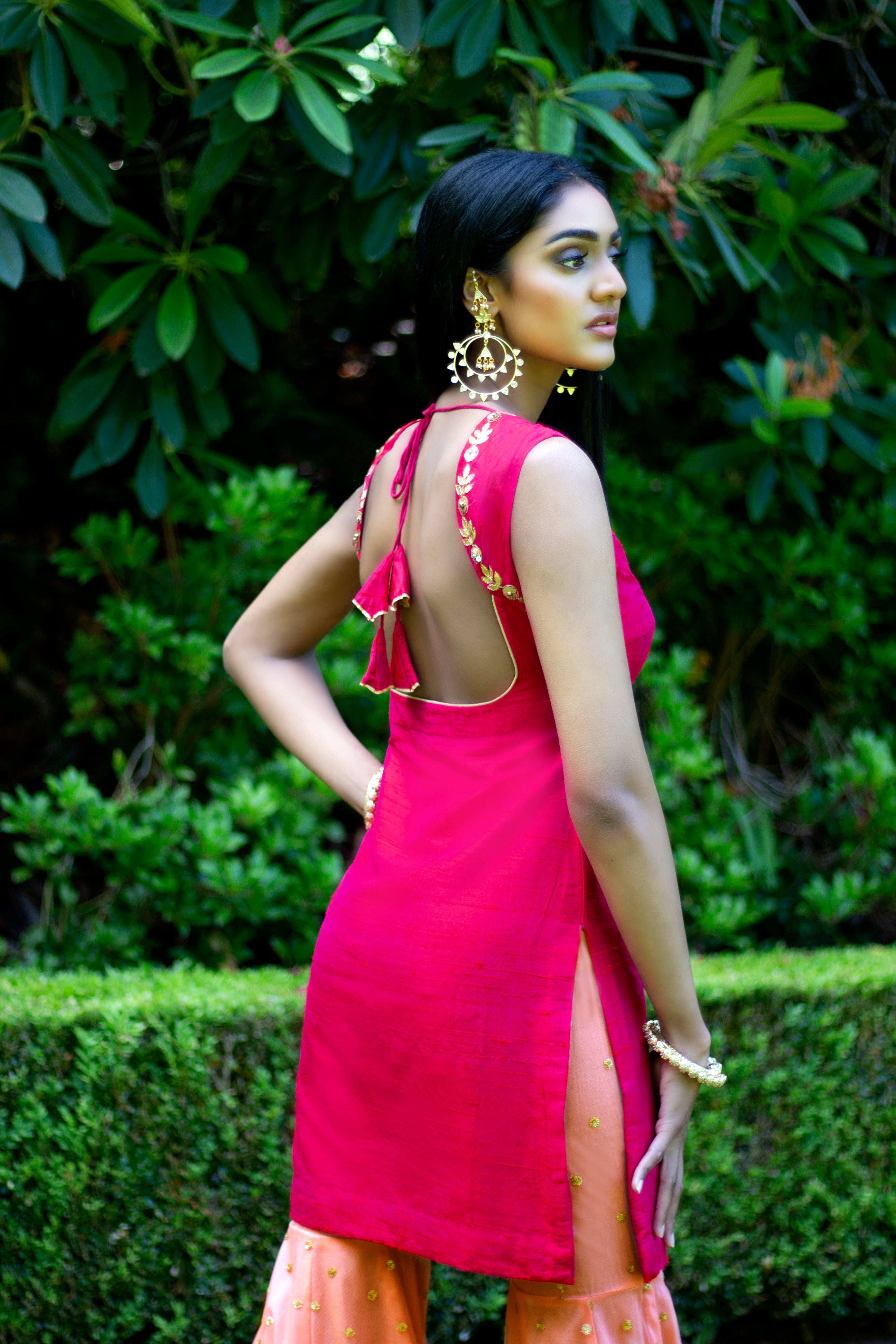 Pink and peach Rani Gharara Sharara by Couture Mantra, featuring intricate embroidery and traditional design.