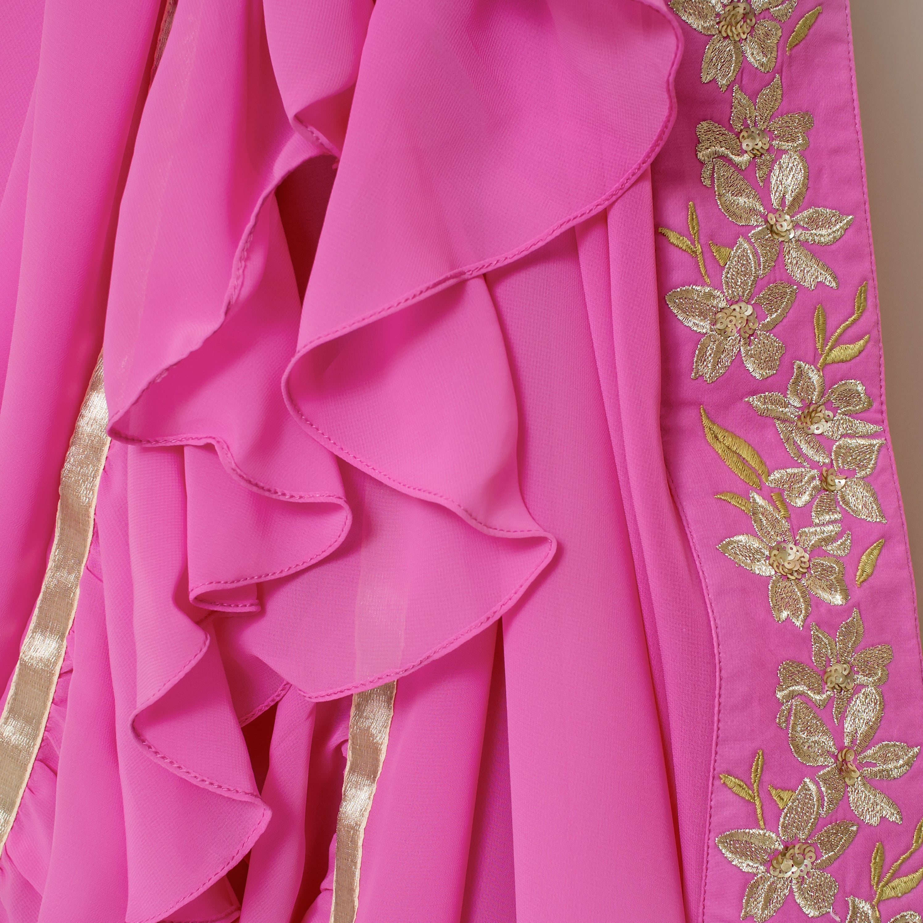 Nakir frill saree blouse featuring elegant ruffle details and intricate embroidery, perfect for traditional Indian attire.
