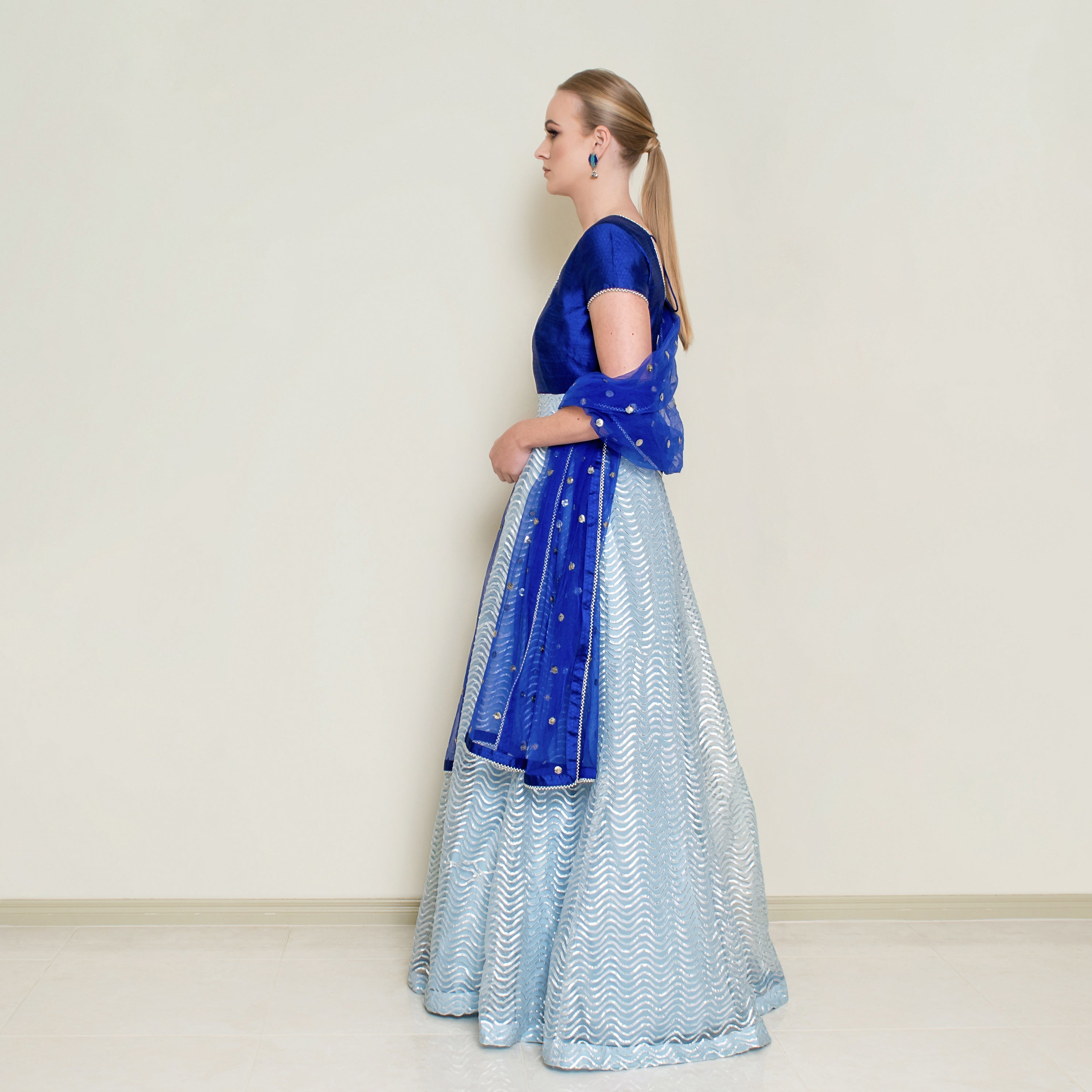 Powder blue Gotta Patti Anarkali dress by Nakir, featuring intricate embroidery and traditional Indian design.