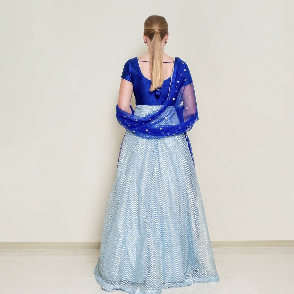 Powder blue Nakir Gotta Patti Anarkali dress with intricate embroidery and traditional design, perfect for festive occasions.