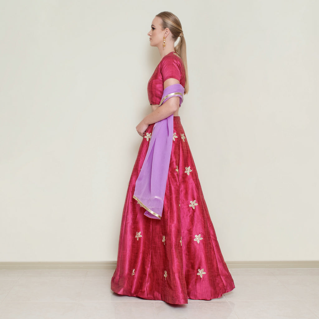 Red Pineapple Lehenga Set by Nakir, vibrant traditional lehnga with intricate detailing and matching accessories.