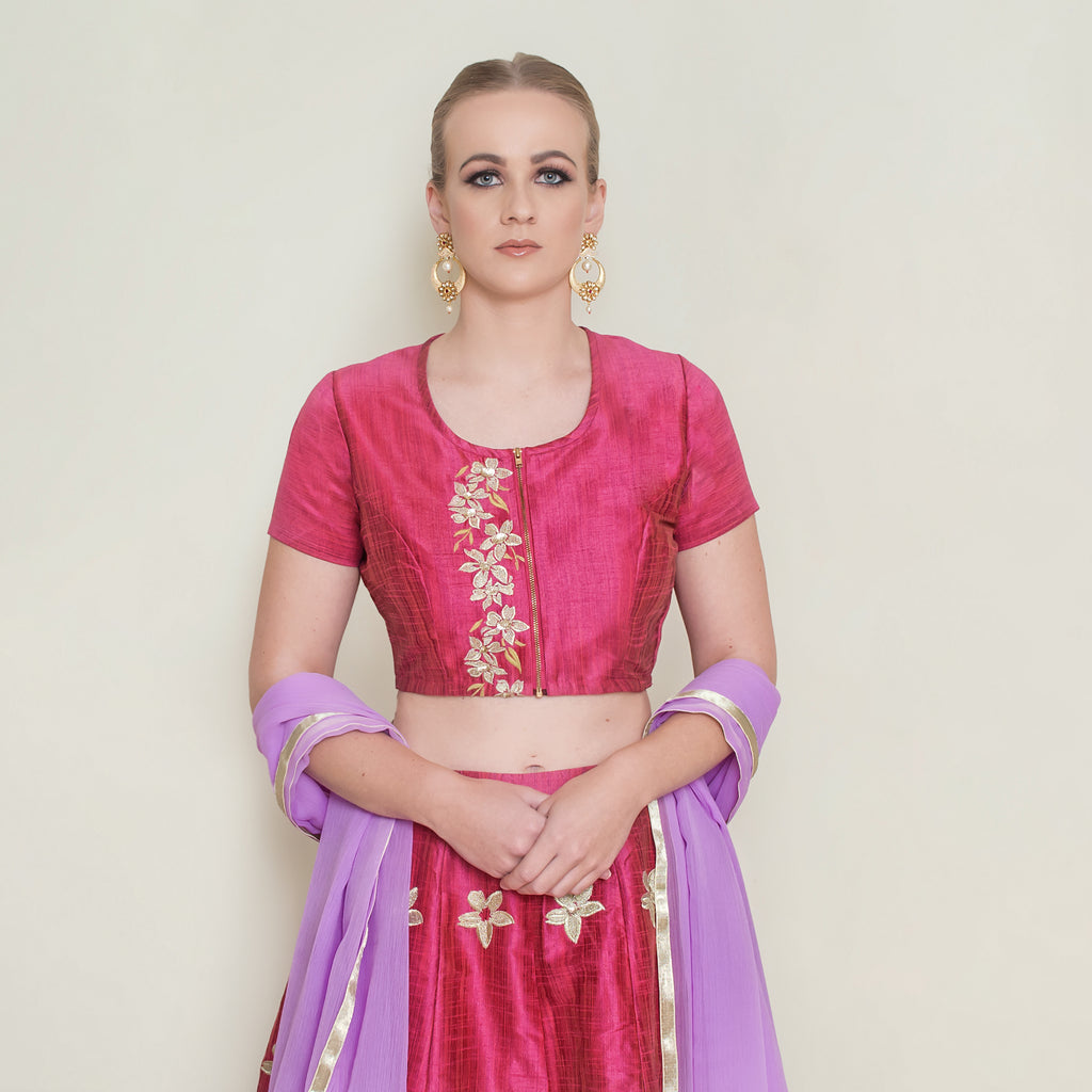 Red Pineapple Lehenga Set by Nakir, featuring traditional embroidered lehnga with intricate details and vibrant color.