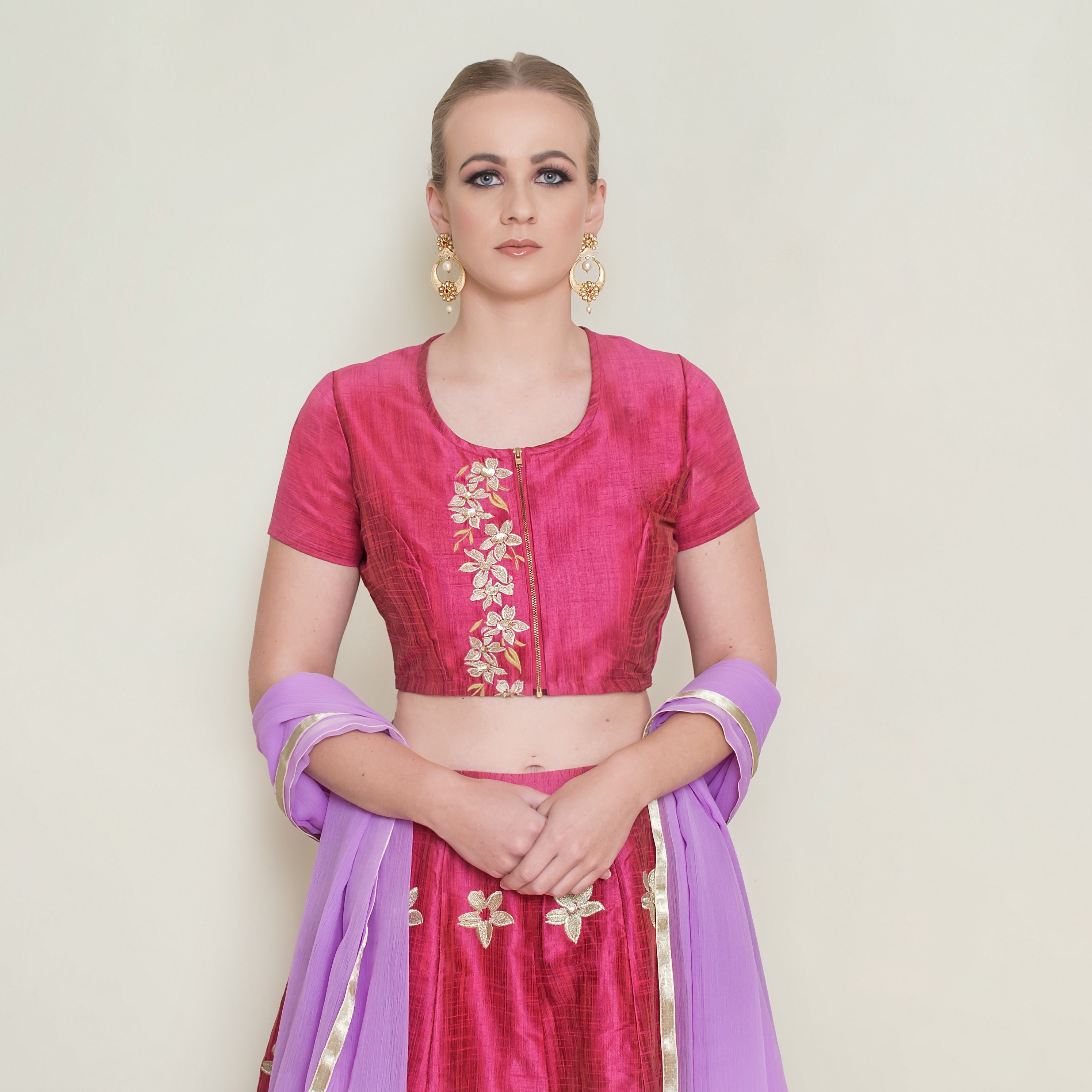 Red Pineapple Lehenga Set by Nakir, featuring traditional embroidered lehnga with intricate details and vibrant color.
