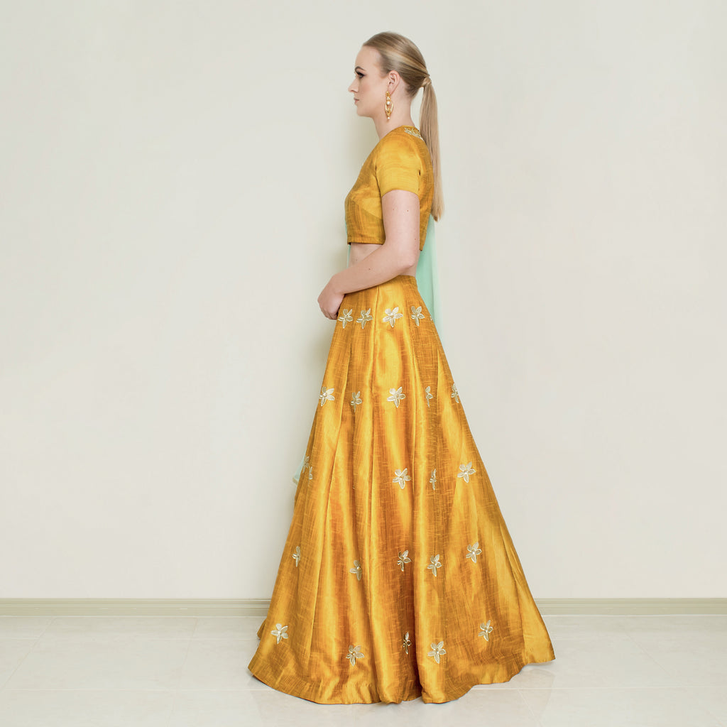 Nakiri mustard pineapple lehenga set featuring traditional embroidery and vibrant colors, perfect for festive occasions.