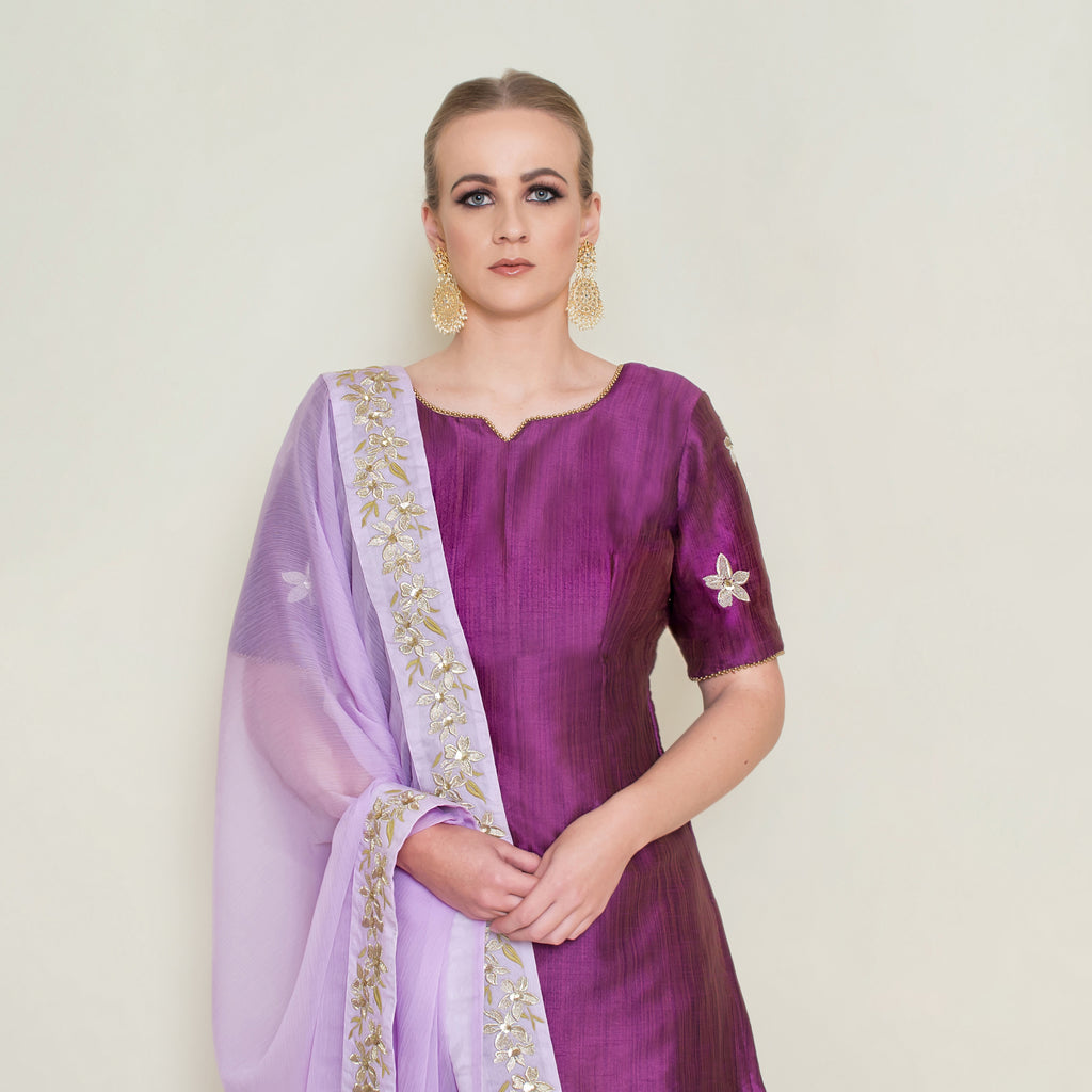 Purple embroidered Sharara set by Nakir, featuring intricate embroidery and traditional design, perfect for festive occasions.