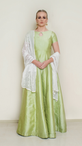 Green Bindi Anarkali dress by Nakir featuring intricate embroidery and flowing fabric, perfect for traditional occasions.