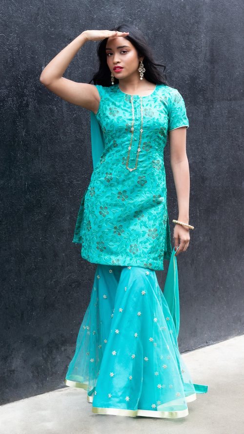 Cotton Mul Gharara set featuring a traditional sharara with intricate embroidery by Couture Mantra, made from soft cotton fabric.