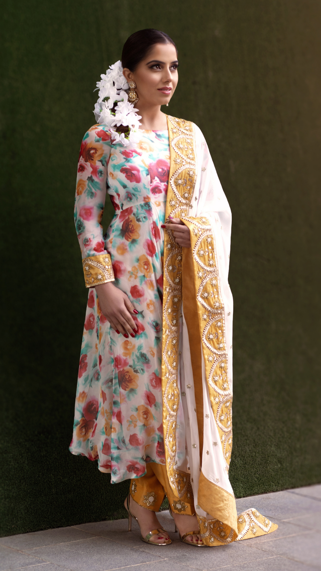 Couture Mantra floral frock set for girls with colorful flower patterns and ruffled details, perfect for special occasions.