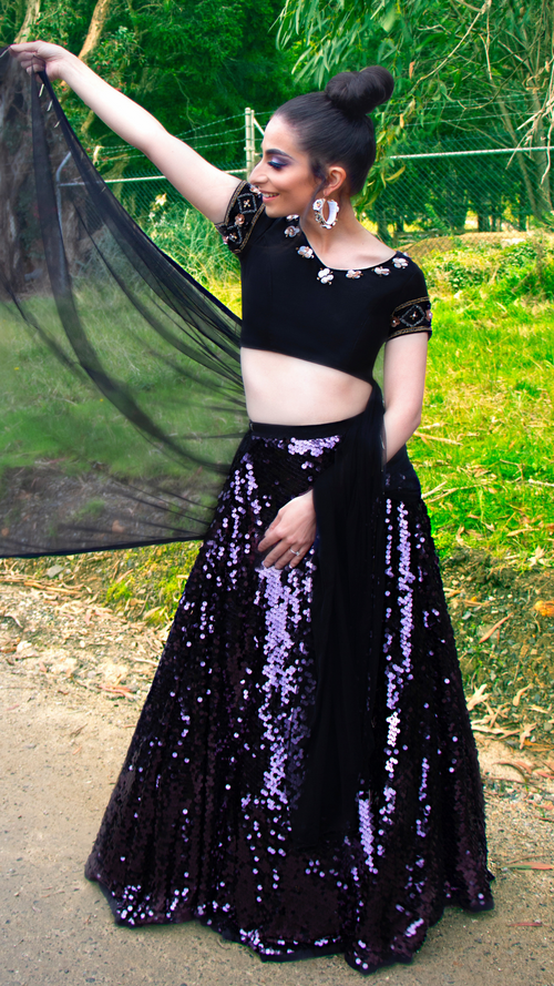 Front view of the Black Devine Silhouette Anshika lehenga, showcasing intricate embroidery and elegant design.