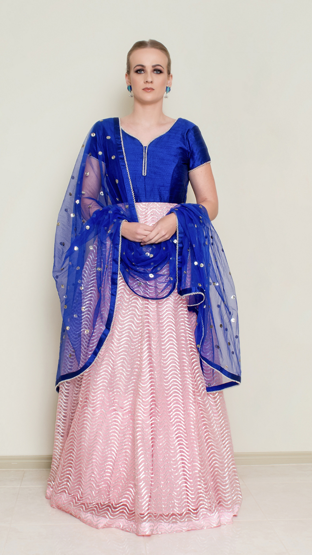 Pink Gotta Patti Anarkali dress by Nakir featuring intricate embroidery and flowing fabric, perfect for traditional festive occasions.