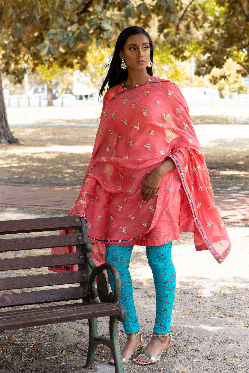 Peach lace pajami suit by Couture Mantra featuring intricate lace details and traditional design, perfect for festive occasions.