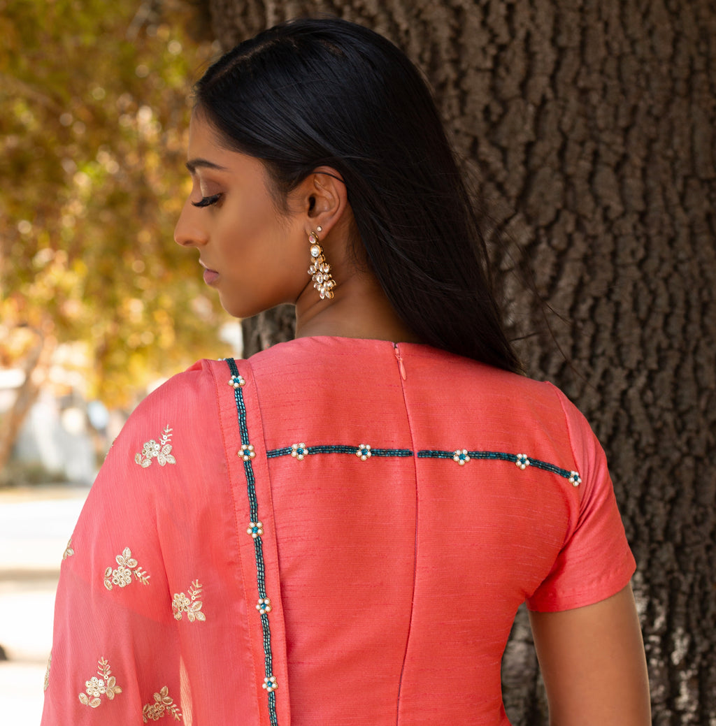 Peach lace pajama suit by Couture Mantra featuring a comfortable, elegant design with intricate lace details.