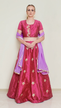 Red Pineapple Lehenga Set by Nakir, featuring a vibrant red lehenga with intricate embroidery and traditional design details.