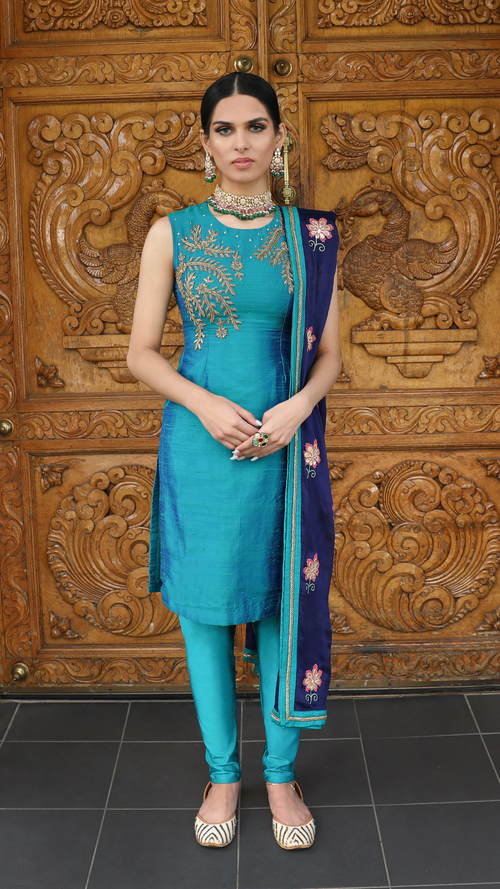 Peacock and midnight blue Begum Kurti set by Couture Mantra featuring a traditional pajami suit with intricate embroidery.